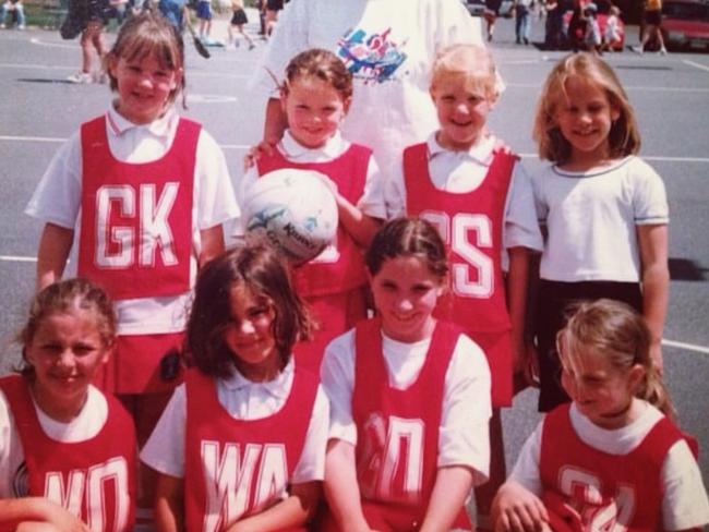 Origin Diamonds player Kate Moloney (GS) with junior team