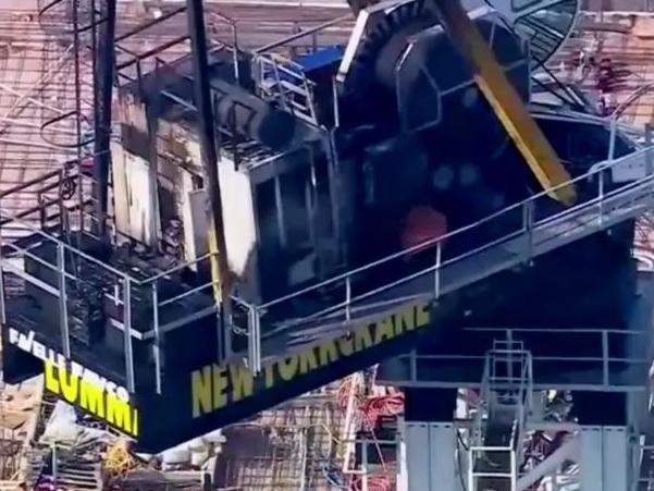 A crane burst into flames in New York although it is unclear what caused the blaze in the cabin area of the crane. Picture: Supplied