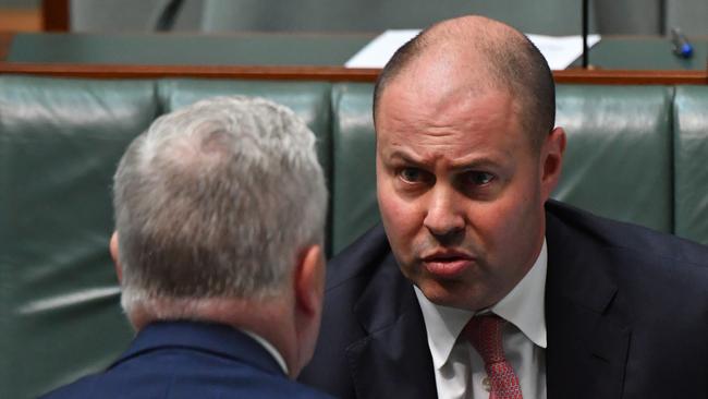 Treasurer Josh Frydenberg, right, in question time in the House of Representatives today. Picture: Getty Images