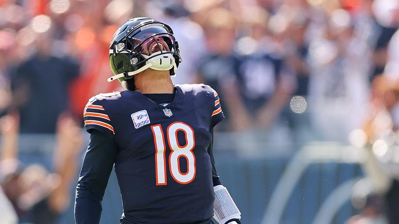 Caleb Williams of the Chicago Bears reacts after throwing a touchdown pass to DJ Moore. Picture: Michael Reaves/Getty Images