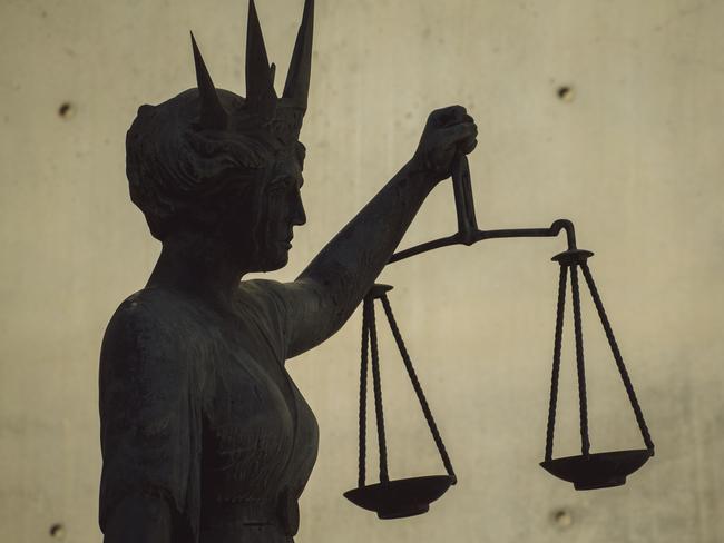 BRISBANE , AUSTRALIA - NewsWire Photos - BRISBANE , JUNE 24 2024: Generic photo of the scales of justice stature outside Brisbane Supreme Court in the Brisbane CBD. Picture: NewsWire / Glenn Campbell