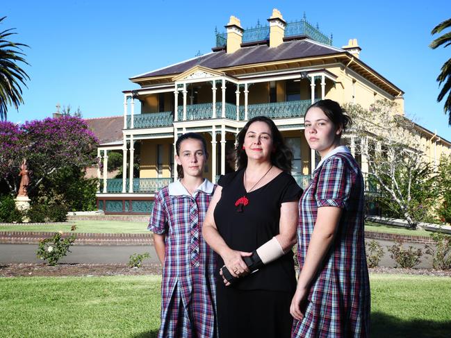 28/3/18: Mother Amanda Gardiner with daughters, Alice 13 and Virginia 15 at Domremy College in Five Dock in Sydney's inner west. Catholic school families have lower household incomes than their neighbours who send their children to independent schools, according to the latest Census data, adding further weight to the Catholic education sectorÕs claims that the current method of non-government schools is biased. John Feder/The Australian.