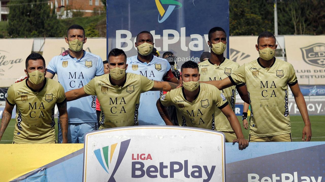 Colombia's Aguilas players pose before a match against Bocaya Chico in Rionegro.