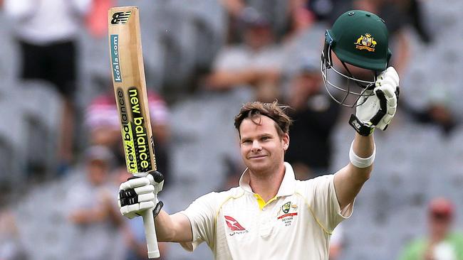 Steve Smith of Australia raises his bat to celebrate his century on day five of the Boxing Day test match between Australia and England at the MCG in Melbourne, Saturday, December 30, 2017. (AAP Image/George Salpigtidis) NO ARCHIVING, EDITORIAL USE ONLY, IMAGES TO BE USED FOR NEWS REPORTING PURPOSES ONLY, NO COMMERCIAL USE WHATSOEVER, NO USE IN BOOKS WITHOUT PRIOR WRITTEN CONSENT FROM AAP