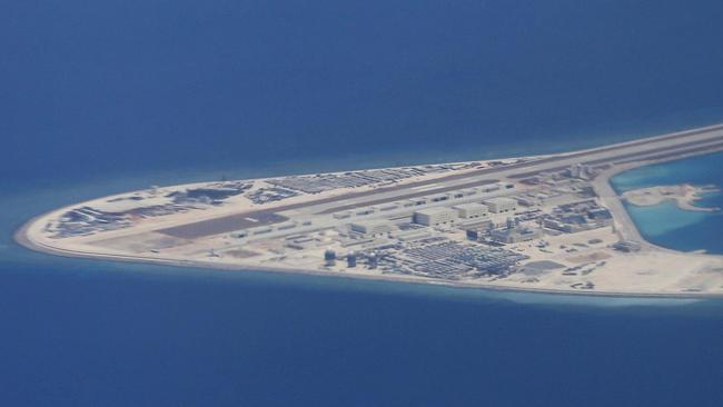 An airstrip, structures and buildings on China's man-made Subi Reef in the Spratly chain of islands in the South China Sea. Picture: AP