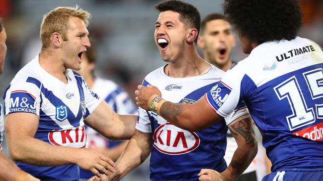 Jeremy Marshall-King celebrates scoring against the Tigers. Photo: Mark Metcalfe/Getty Images