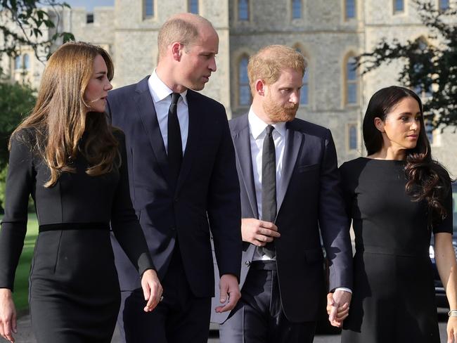 WINDSOR, ENGLAND - SEPTEMBER 10: Catherine, Princess of Wales, Prince William, Prince of Wales, Prince Harry, Duke of Sussex, and Meghan, Duchess of Sussex on the long Walk at Windsor Castle on September 10, 2022 in Windsor, England. Crowds have gathered and tributes left at the gates of Windsor Castle to Queen Elizabeth II, who died at Balmoral Castle on 8 September, 2022. (Photo by Chris Jackson - WPA Pool/Getty Images)