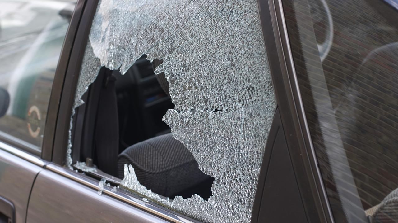 car window smashes by boys throwing rocks The Courier Mail