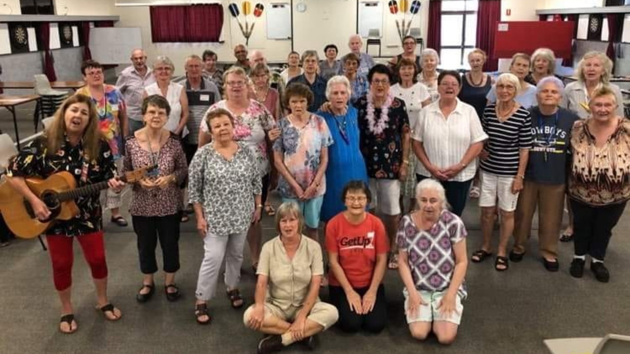 Valerie Forrest (centre in blue) has loved her time singing with the Seniors Creating Change choir and raising awareness about elder abuse.