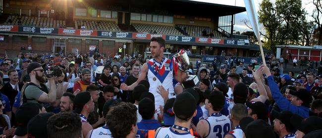 Captain Nathan Valladares is hoisted onto the shoulders of West Preston-Lakeside supporters.