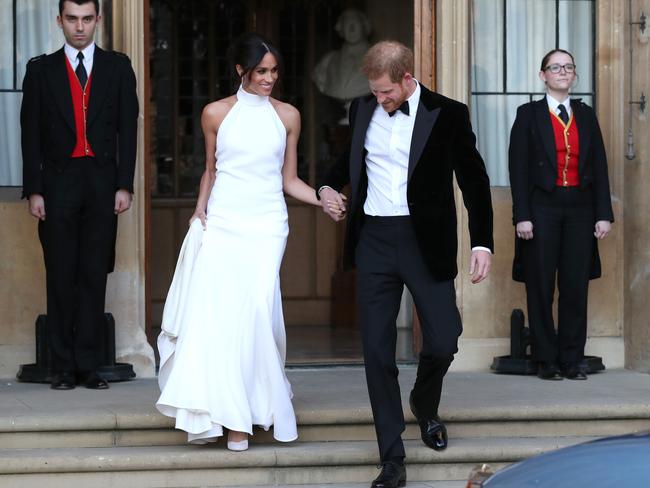 ‘Dress number two. God knows you’ve all seen this 60,000 times already today. Isn’t it darling? So simple, so elegant. She looks hot. Hazza looks swell in a tux too. May they live happily ever after!’ Picture: MEGA