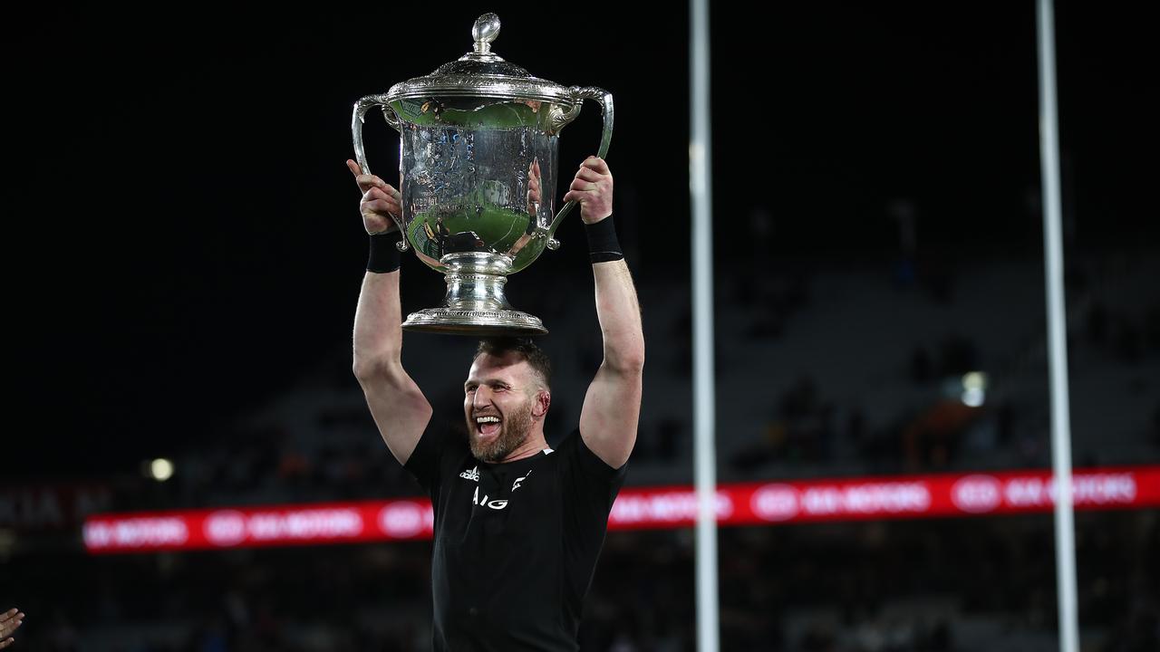 All Blacks captain Kieran Read lifts the Bledisloe Cup.