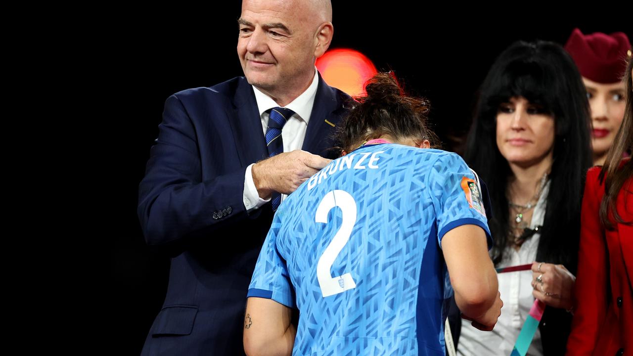 She accepts her medal. Picture: Catherine Ivill/Getty Images