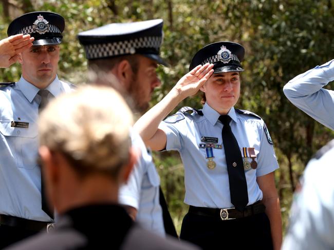 Mourners at the memorial service with full police honours for fallen constables Rachel McCrow and Matthew Arnold at Brisbane Entertainment Centre. Picture: Steve Pohlner