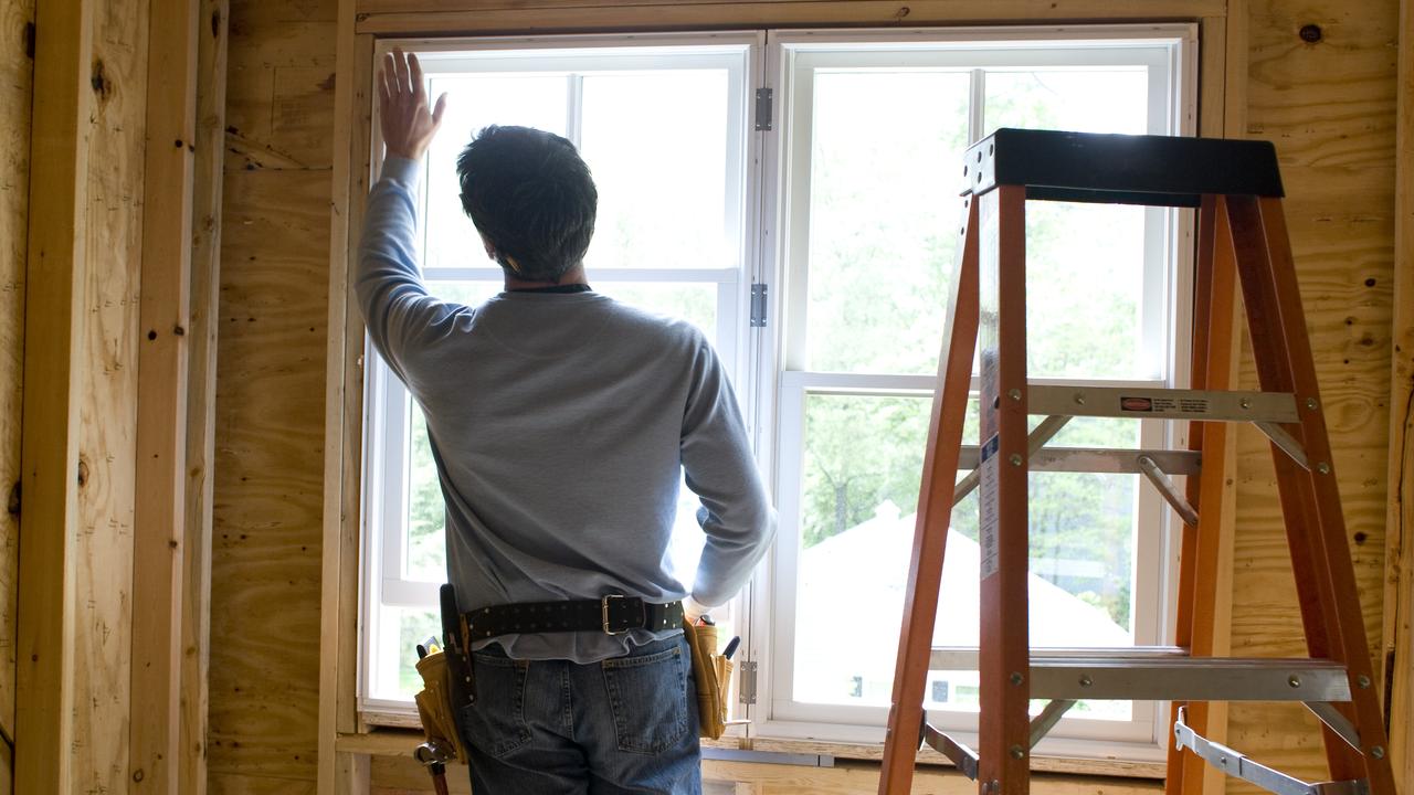 A tradesman working on home construction. All building related trades should be licensed with the QBCC. Picture: Supplied