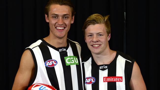 A fresh-faced De Goey with teammate Darcy Moore on draft night in 2014. Picture: Stephen Harman