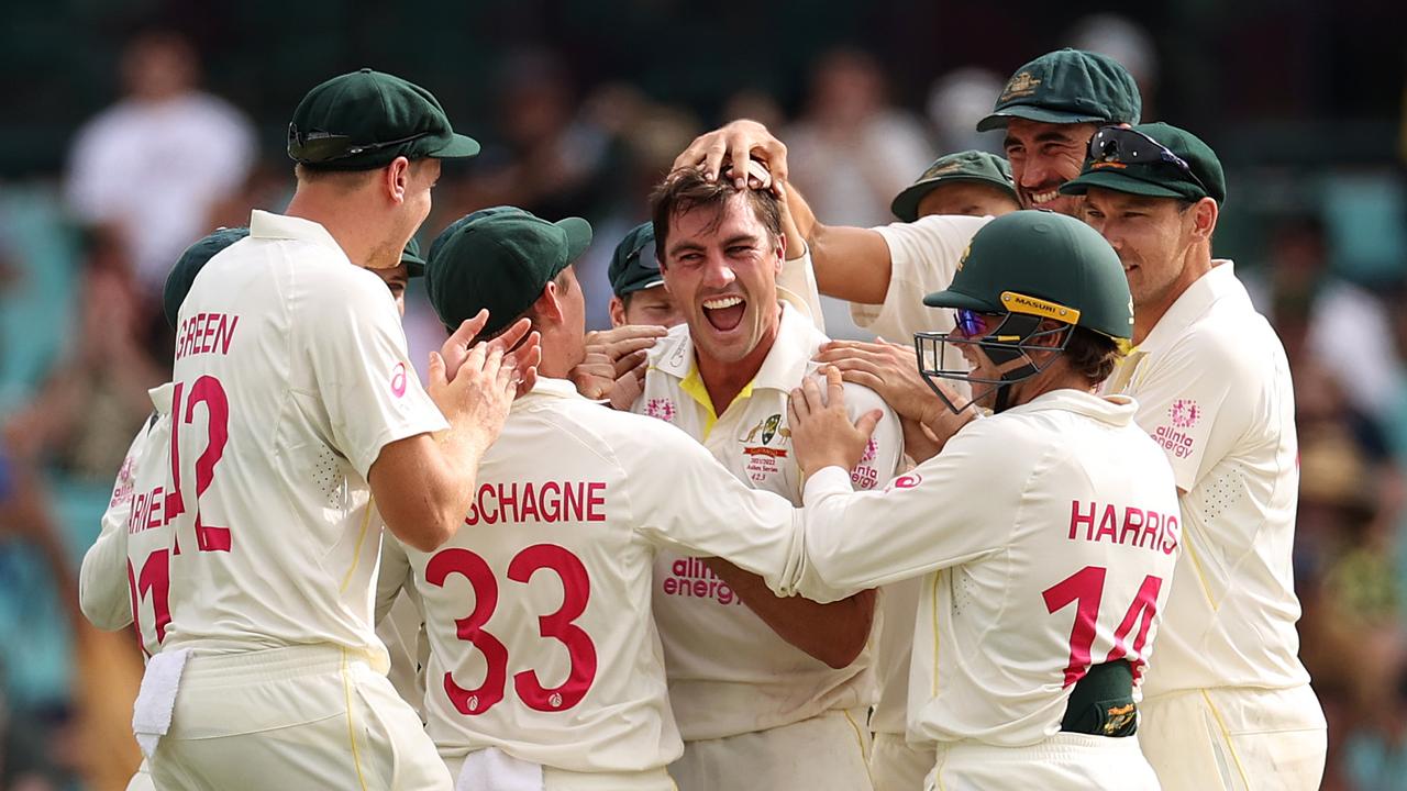 Pat Cummins celebrates the dismissal of Jos Buttler. Photo by Cameron Spencer/Getty Images