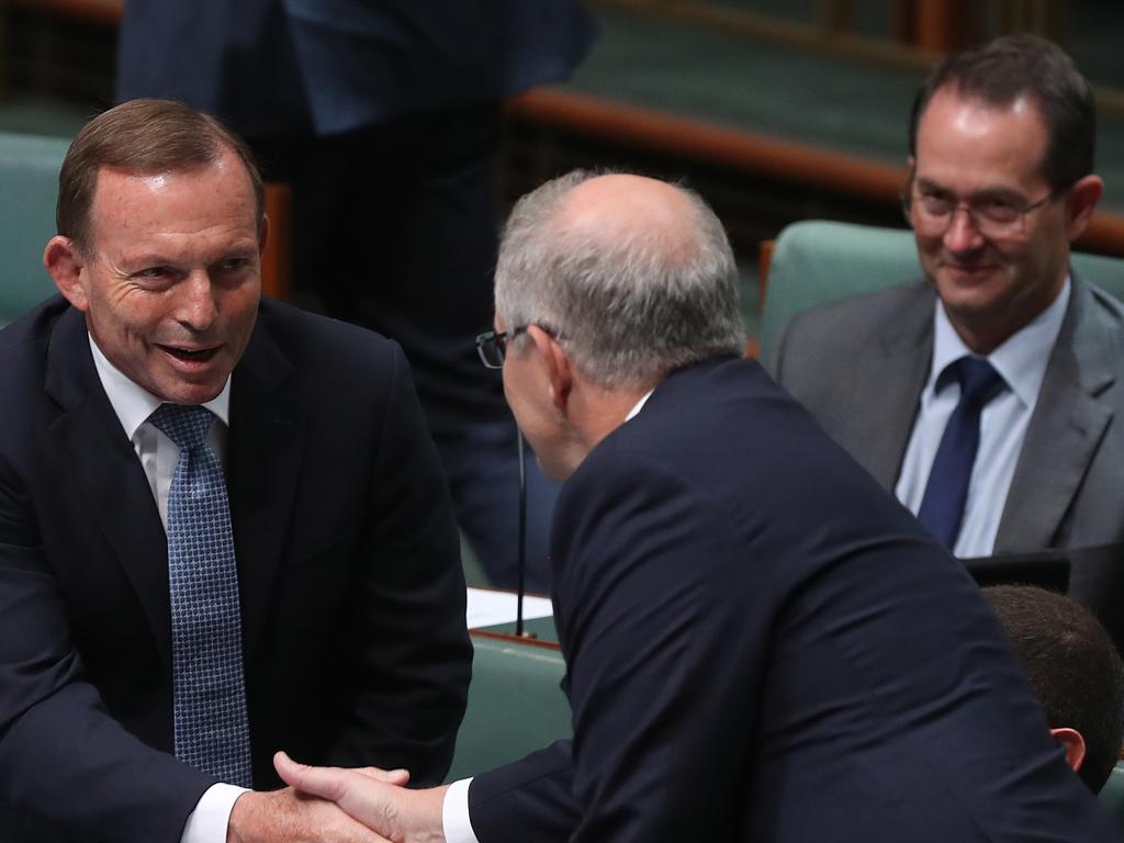 Scott Morrison shakes hands with former PM Tony Abbott. Picture: Kym Smith