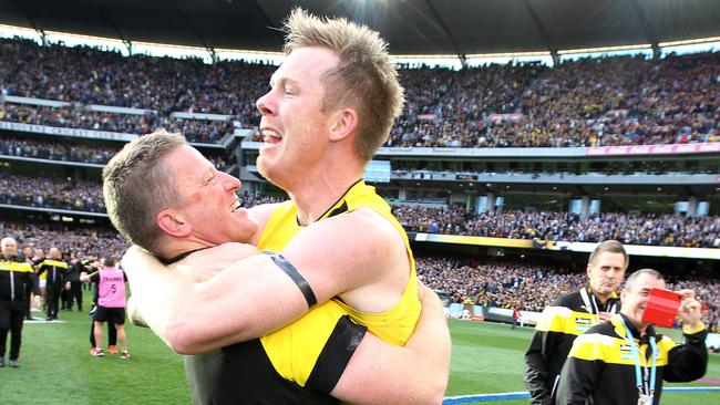 Jack Riewoldt jumps into the arms of coach Damien Hardwick. Pic: Michael Klein