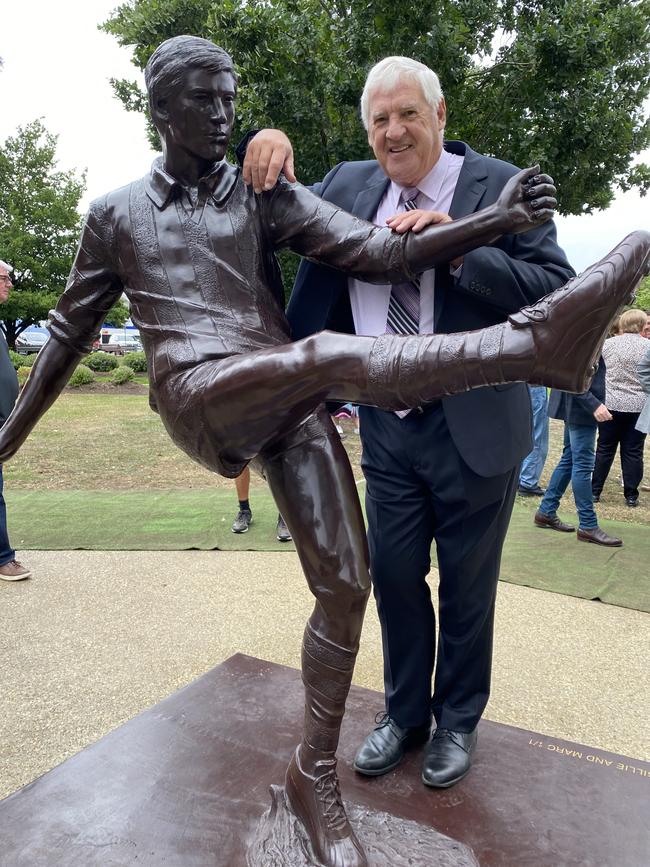 Tasmanian footy legend Peter Hudson with the statue unveiled in his honour today in the town where it all started – New Norfolk. Picture: James Bresnehan