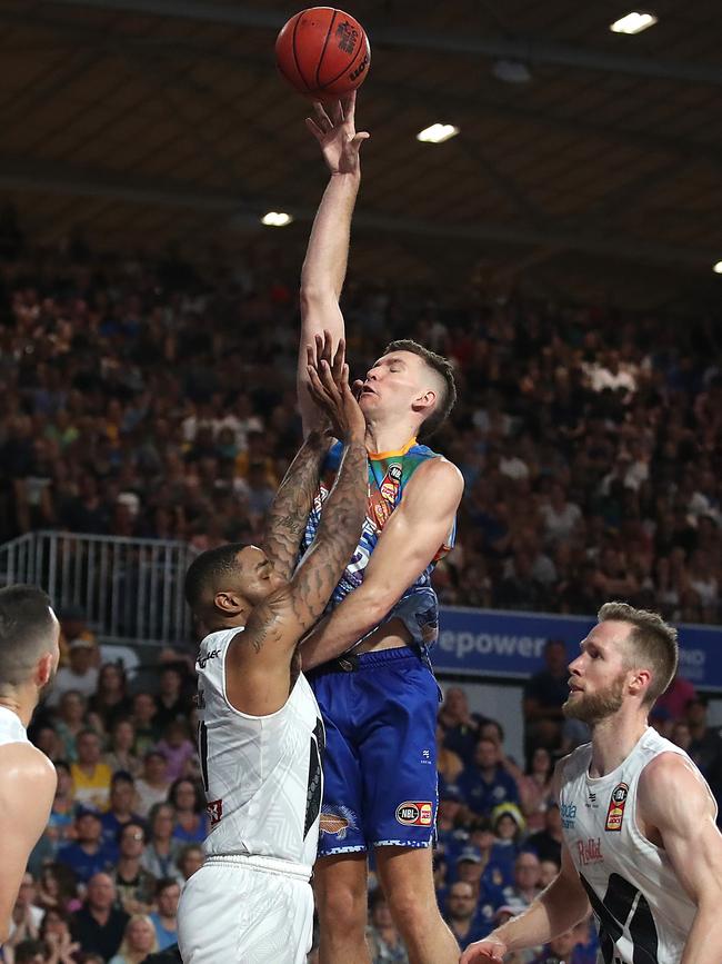 Will Magnay surges to the basket for the bullets, showing his aerial prowess.