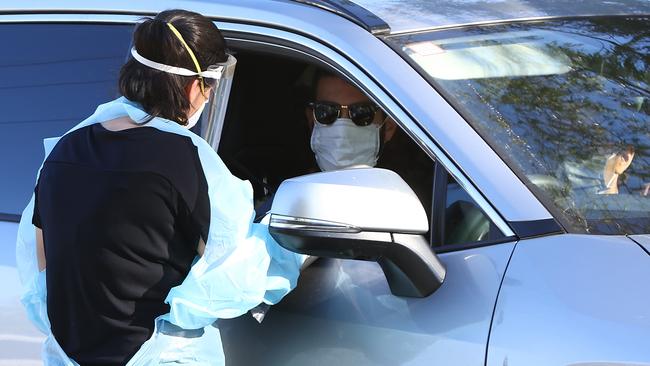 People getting tested for COVID-19 in Perth on Monday. Picture: Paul Kane/Getty Images