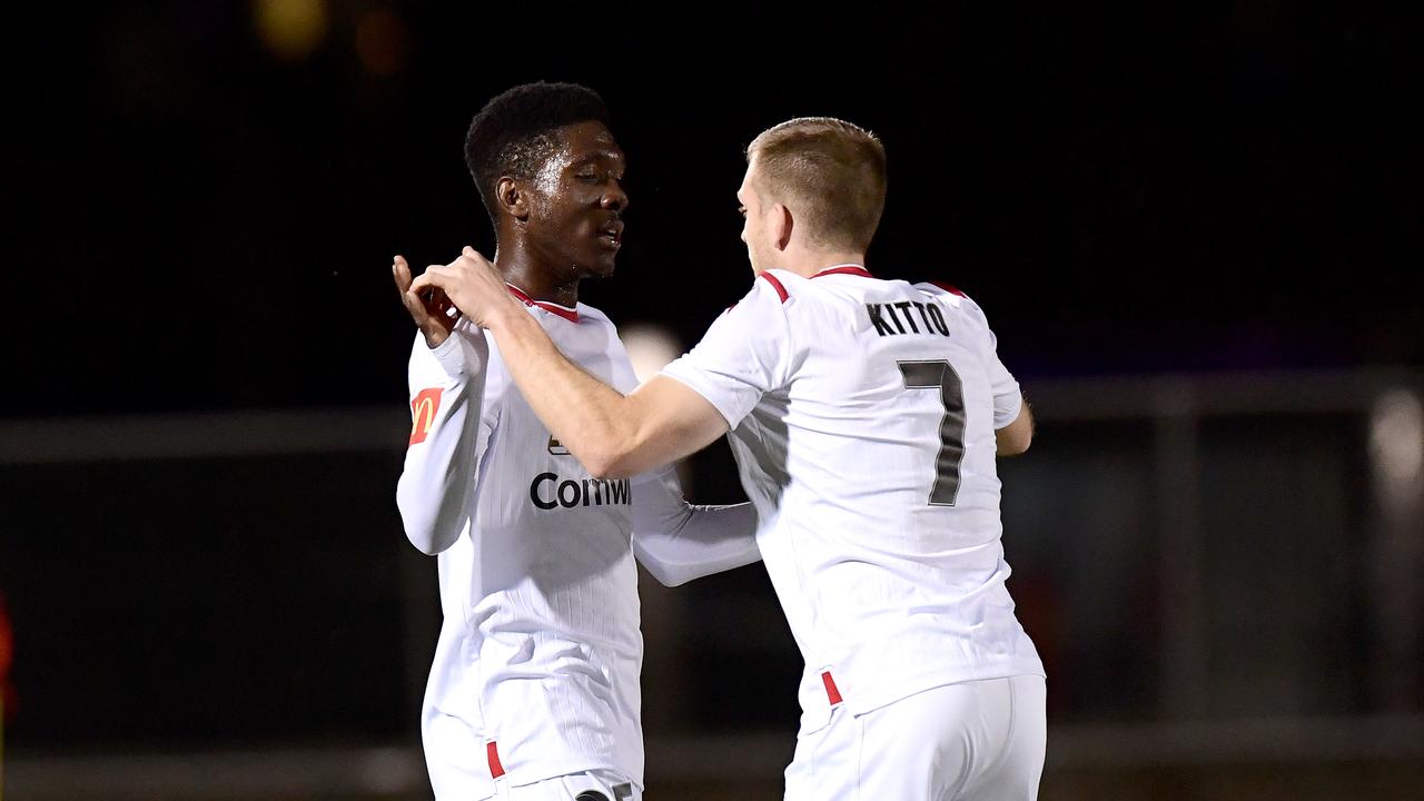 Al Hassan Toure of Adelaide celebrates another FFA Cup goal. (Photo by Bradley Kanaris/Getty Images)