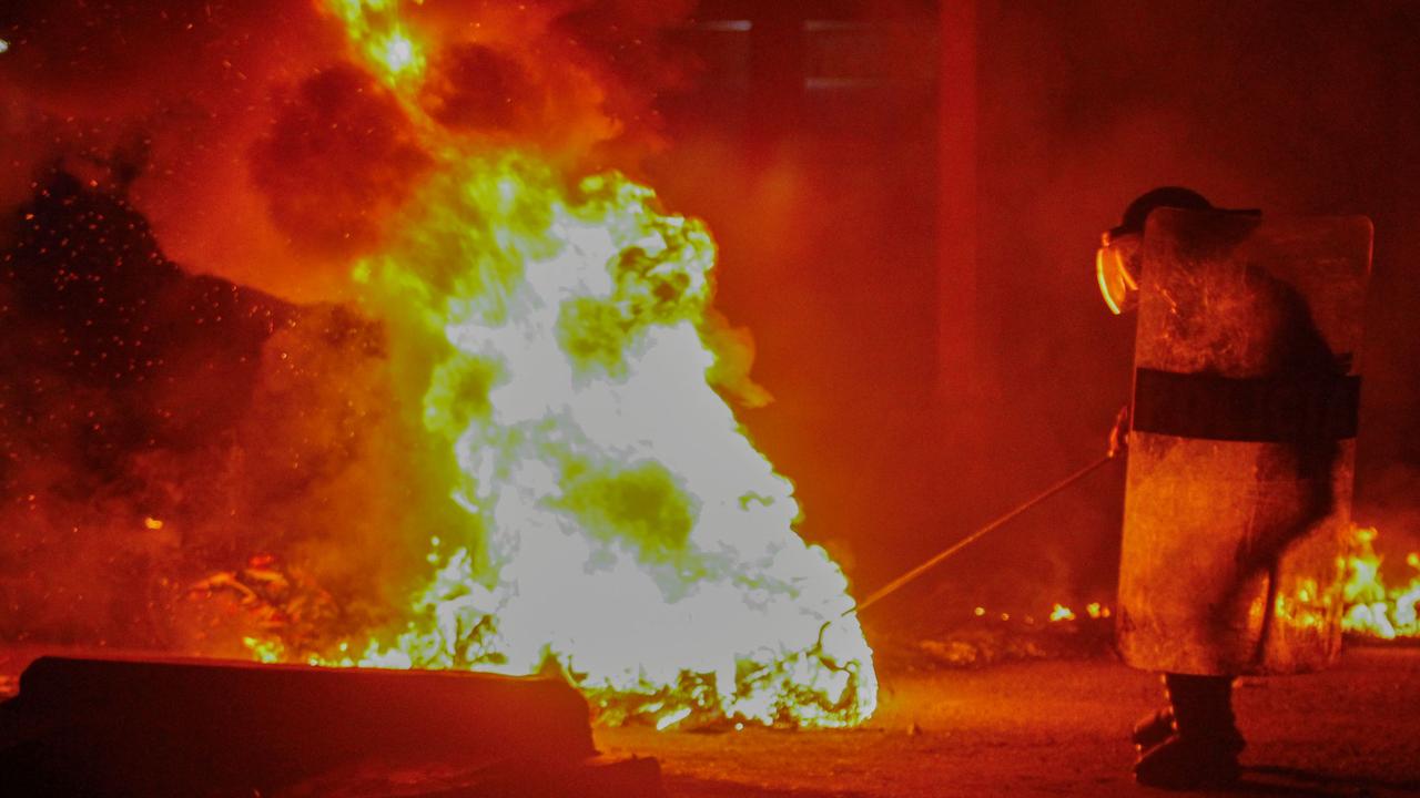 Agro-industrial workers and citizens of Chao, 500 kilometres north of Lima answer the call for a national strike, set tires on fire and block the Pan-American Highway to demand the resignation of Peruvian President Dina Boluarte and the closure of Congress on February 17, 2023. Picture: Arturo Gutarra / AFP