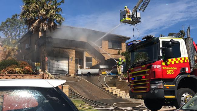 A house on fire along Beatus Street, Unanderra. Picture: Madeline Crittenden