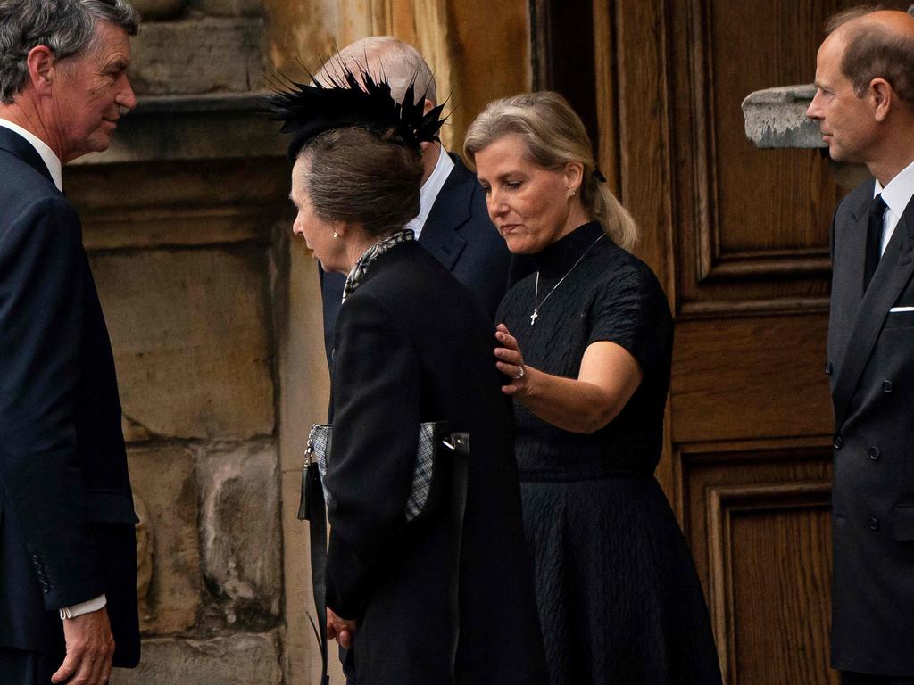 Prince Edward’s wife Sophie, Countess of Wessex, consoles Princess Anne as the Queen’s coffin arrives in Edinburgh. Picture: AFP.