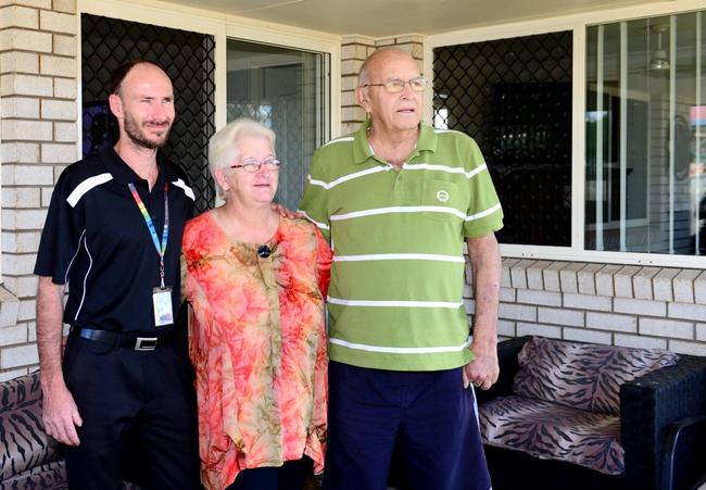 RentConnect officer Wayne Stevens, from the Department of Housing and Public Works with Michelle and Ron Sherwood in the back yard of their new rental home. Photo Sharyn O'Neill / The Morning Bulletin. Picture: Sharyn O'Neill