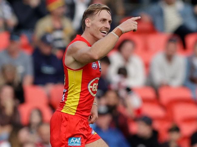 GOLD COAST, AUSTRALIA - JULY 15: Darcy Macpherson of the Suns celebrates a goal during the 2023 AFL Round 18 match between the Gold Coast Suns and the St Kilda Saints at Heritage Bank Stadium on July 15, 2023 in the Gold Coast, Australia. (Photo by Russell Freeman/AFL Photos via Getty Images)