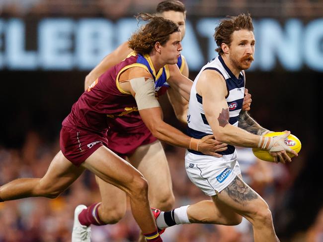 BRISBANE, AUSTRALIA - OCTOBER 17: Zach Tuohy of the Cats and Jarrod Berry of the Lions in action during the 2020 AFL Second Preliminary Final match between the Brisbane Lions and the Geelong Cats at The Gabba on October 17, 2020 in Brisbane, Australia. (Photo by Michael Willson/AFL Photos via Getty Images)