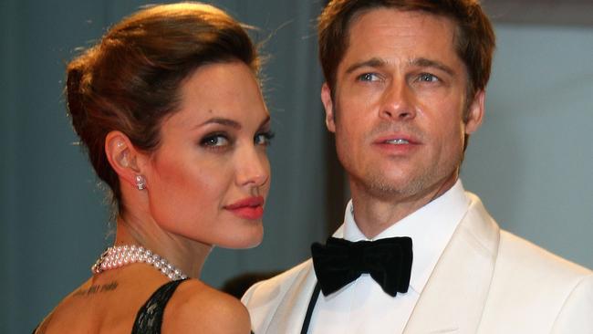 VENICE, ITALY - SEPTEMBER 02:  Angelina Jolie and Brad Pitt attend the The Assassination of Jesse James by the Coward Robert Ford premiere on the Day 5 of the 64th Annual Venice Film Festival on September 2, 2007 in Venice, Italy.  (Photo by MJ Kim/Getty Images)