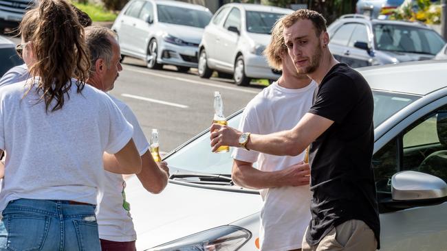 Devastated friends paid tribute to Liam with a beer. Picture: Monique Harmer