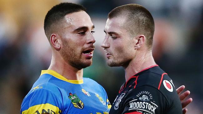 Kieran Foran of the Warriors is congratulated by Corey Norman of the Eels.