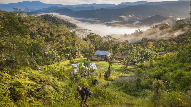 A hiker leaves Nauro village along the Kokoda Trail. Picture: Getty