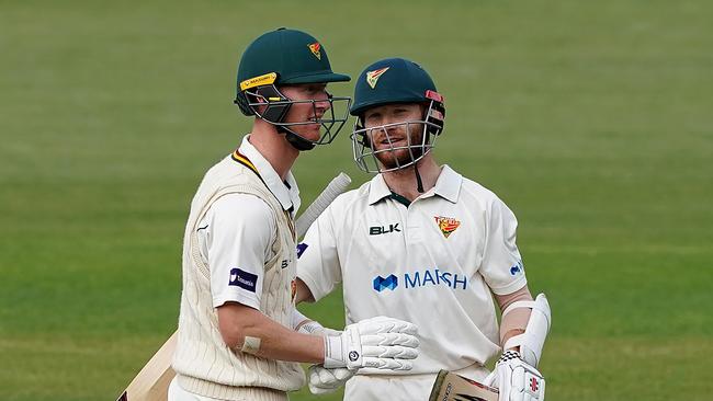 Tigers batsmen Jordan Silk (left) and Charlie Wakim after Silk hit the winning runs on day 3 of the Marsh Sheffield Shield cricket match between the Tasmanian Tigers and the NSW Blues at Blundstone Arena in Hobart, Sunday, March 8, 2020. Picture: AAP Image/Dave Hunt