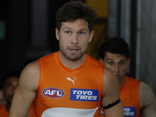 MELBOURNE, AUSTRALIA. April 20, 2024. AFL Round 6. Carlton vs. GWS Giants at Marvel Stadium. Toby Greene leads the Giants onto Marvel Stadium. Pic: Michael Klein