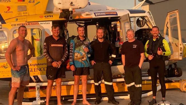 RACQ CQ Rescue crew with Ryan Taylor, Mitch Cook and Sean Cook after their dramatic rescue off the Mackay coast on Friday when the trio's boat sank about 18km from shore. Pictures: RACQ CQ Rescue