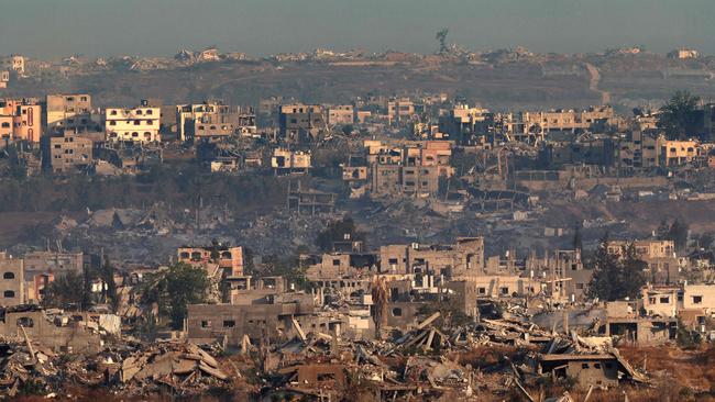 A picture taken from the Israeli side of the border with the Gaza Strip shows destroyed buildings in the nothern sector of the besieged Palestinian territory. Picture: AFP