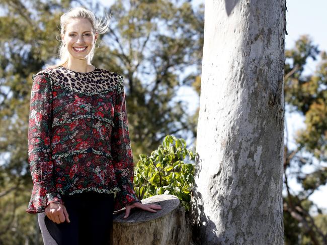 Queensland Firebirds netball player Laura Geitz poses for photographs during a press conference announcing her retirement from all forms of the game, Brisbane, Friday, August 31, 2018. Geitz said she will be taking time off to focus on her young family. (AAP Image/Regi Varghese) NO ARCHIVING