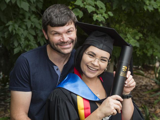 Bachelor of Nursing graduate Mel Self celebrates with husband Andrew Self at a UniSQ graduation ceremony at Empire Theatres, Tuesday, February 13, 2024. Picture: Kevin Farmer