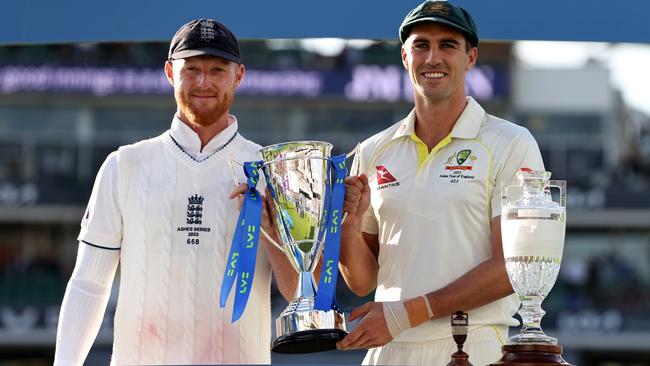 Pat Cummins of Australia and Ben Stokes of England pose with the Ashes Trophy following day five of the Ashes 5th Test match between England and Australia at The Oval.