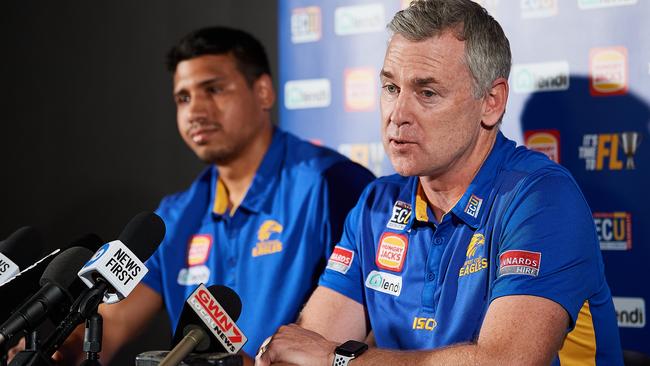 Kelly addresses the media with coach Adam Simpson. Picture: AFL Photos/Getty Images