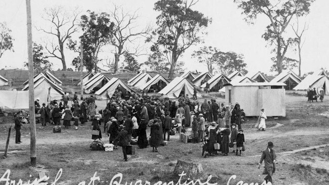 People arriving at the Spanish influenza quarantine camp, in Wallangarra in Queensland, in May 1919, when Queensland's border was closed to travellers from NSW. Picture: State Library of Queensland 