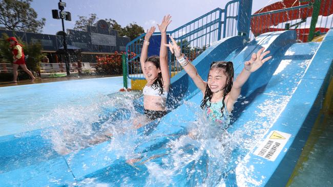 Sophia, 7 and Alessia, 12, enjoying the Oasis Springs in Gumbuya World. Picture: Alex Coppel