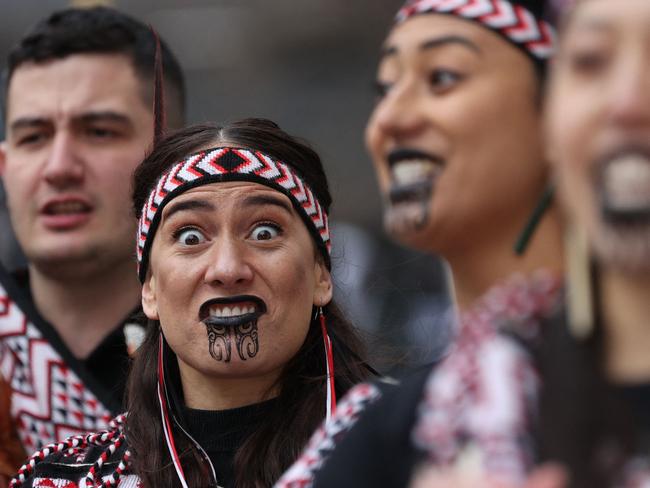 Members of the Ngati Ranana London Maori Club perform outside Westminster Abbey, in London. Picture: AFP