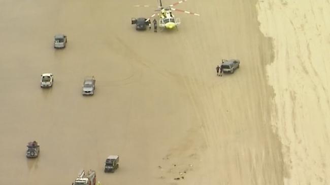 The scene of the 4WD rollover at Teewah Beach on Sunday afternoon. Photo: Nine News