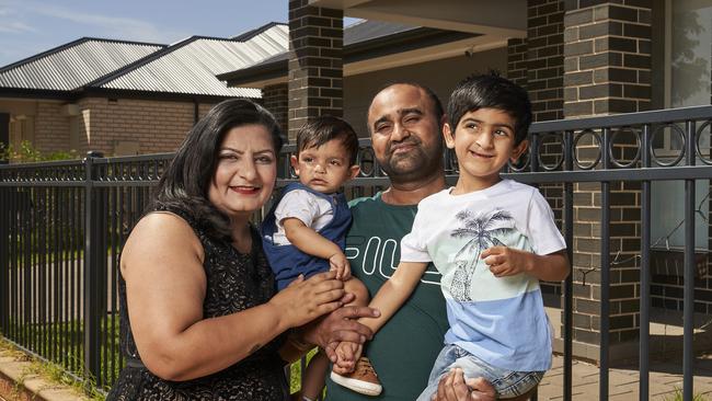 Sukhdeep Kaur, and Aevin, Sandeep and Armin Singh outside their home in Munno Para, Playford Alive. Picture: Matt Loxton